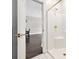 Bathroom with a shower-tub combination visible through an open door to a dining area at 4721 Hibiscus Dr. # 3-302, Little River, SC 29566