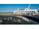 Casino ship docked at a pier, offering cruises and entertainment on the water at 4721 Hibiscus Dr. # 3-302, Little River, SC 29566