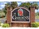 Brick community sign with a black sign reading 'The Gardens at Cypress Bay' at 4721 Hibiscus Dr. # 3-302, Little River, SC 29566