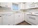 Kitchen area featuring white cabinets, stainless steel appliances, and a dishwasher for convenience at 4721 Hibiscus Dr. # 3-302, Little River, SC 29566