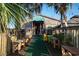 Exterior view of a restaurant featuring outdoor seating and rustic wooden decor at 4721 Hibiscus Dr. # 3-302, Little River, SC 29566