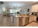 Modern kitchen with granite countertops, stainless steel appliances, and an open layout, seamlessly connected to the dining and living areas at 4901 N Market St., North Myrtle Beach, SC 29582