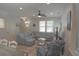 Comfortable living room featuring a large sectional sofa, stylish decor, and ample natural light at 4901 N Market St., North Myrtle Beach, SC 29582