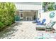 Spacious patio with comfortable seating, a bar table, and a partial view of the home at 4901 N Market St., North Myrtle Beach, SC 29582