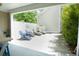 Charming outdoor patio with lounge chairs and blue Adirondack chairs at 4901 N Market St., North Myrtle Beach, SC 29582
