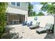 Inviting outdoor patio with lounge chairs, bar area, and pavers, perfect for relaxing and enjoying the weather at 4901 N Market St., North Myrtle Beach, SC 29582