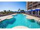 Expansive pool area with multiple pools, lounge chairs, and cabanas, offering a relaxing and luxurious resort experience at 4901 N Market St., North Myrtle Beach, SC 29582
