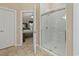 Bathroom with glass-enclosed shower and access to the main bedroom at 499 Trestle Way, Conway, SC 29526