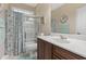 Bright bathroom featuring a shower-tub combo, vanity, and decorative elements at 499 Trestle Way, Conway, SC 29526