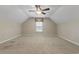 Expansive bonus room with a ceiling fan and carpeted floors at 499 Trestle Way, Conway, SC 29526