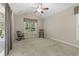Bright bonus room with carpeted floors and natural light from the window at 499 Trestle Way, Conway, SC 29526