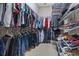 Organized walk-in closet with ample shelving and storage space for clothes and shoes at 499 Trestle Way, Conway, SC 29526