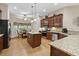 Spacious kitchen featuring a breakfast nook, granite countertops, and stainless steel appliances at 499 Trestle Way, Conway, SC 29526