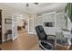Inviting office space featuring a built-in bookcase, and a view of dining area at 499 Trestle Way, Conway, SC 29526