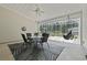 Stylish screened porch has ceiling fan and furniture at 499 Trestle Way, Conway, SC 29526