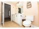 Cozy bathroom featuring beige walls, a single vanity, and a toilet at 5096 Capulet Circle, Myrtle Beach, SC 29588