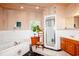 Bright bathroom with tub, shower, vanity, and lots of counter space at 514 Blockade Dr., Pawleys Island, SC 29585