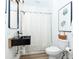 Modern bathroom with sleek black fixtures, stylish sink, and contemporary design at 514 Blockade Dr., Pawleys Island, SC 29585