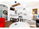 Open kitchen featuring modern appliances, bar seating, and clean white cabinetry for a sleek, inviting space at 514 Blockade Dr., Pawleys Island, SC 29585