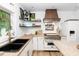 Well-lit kitchen with butcher block countertops, stainless steel appliances, and stylish fixtures at 514 Blockade Dr., Pawleys Island, SC 29585