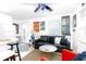 Relaxing living room with colorful artwork, comfortable seating, and a bright atmosphere for everyday enjoyment at 514 Blockade Dr., Pawleys Island, SC 29585