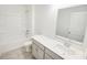 Cozy bathroom features a shower-tub combo, single vanity and neutral wall color at 547 Pacific Commons Dr., Surfside Beach, SC 29575