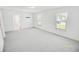 Large bedroom with neutral carpet and good natural light at 547 Pacific Commons Dr., Surfside Beach, SC 29575