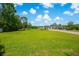 Spacious lot with a well-manicured lawn and landscaping at 547 Pacific Commons Dr., Surfside Beach, SC 29575