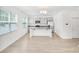 Spacious open-concept living area, connecting the kitchen and dining spaces with lots of natural light at 547 Pacific Commons Dr., Surfside Beach, SC 29575