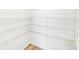 Well-organized pantry with metal shelving for efficient storage and easy access at 547 Pacific Commons Dr., Surfside Beach, SC 29575