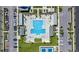 Aerial view of the community pool with tennis courts, cabana, and parking at 598 Cascade Loop, Little River, SC 29566
