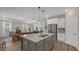 Updated kitchen boasting a large island, stainless steel appliances, and modern finishes at 598 Cascade Loop, Little River, SC 29566