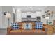 Cozy living room featuring a leather couch and view of the gourmet kitchen at 598 Cascade Loop, Little River, SC 29566