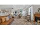Spacious living area offering a view of the dining room, fireplace, and outdoor scenery at 598 Cascade Loop, Little River, SC 29566