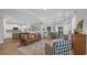 Open living space showcasing the kitchen, living room, and dining area with modern furnishings at 598 Cascade Loop, Little River, SC 29566