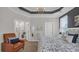 The black accent wall gives a contrast to the rest of the features in the main bedroom at 598 Cascade Loop, Little River, SC 29566