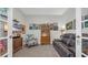 Home office featuring comfortable seating, display case, and plenty of decorative elements at 598 Cascade Loop, Little River, SC 29566
