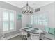 Charming breakfast nook with custom seating, natural light, and coastal decor at 6001- Q10 S Kings Hwy., Myrtle Beach, SC 29575