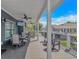 Spacious covered porch with ceiling fans, TV, and outdoor seating, perfect for entertaining at 6001- Q10 S Kings Hwy., Myrtle Beach, SC 29575