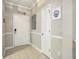 Bright entryway with neutral walls, tile flooring, and charming coastal decor at 6015 Catalina Dr. # 634, North Myrtle Beach, SC 29582