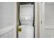 Convenient in-unit stacked washer and dryer in a closet with louvered doors at 6015 Catalina Dr. # 634, North Myrtle Beach, SC 29582