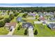 Aerial view of the neighborhood with the home, pond, water feature, and surrounding properties at 605 Fieldwoods Dr., Conway, SC 29526