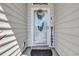 Close up of the front door with decorative glass and a welcoming wreath at 605 Fieldwoods Dr., Conway, SC 29526