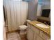 Cozy bathroom features granite countertops, white cabinets, and neutral tile flooring at 620 Wave Rider Ln. # B10-1, North Myrtle Beach, SC 29582