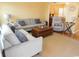 Inviting living room with neutral-toned sofas, stylish decor, and open access to other living areas at 620 Wave Rider Ln. # B10-1, North Myrtle Beach, SC 29582