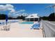 Community pool and lounge chairs under a sunny sky at 620 Wave Rider Ln. # B10-1, North Myrtle Beach, SC 29582