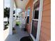 Charming porch with white columns, rocking chairs, and views of the neighborhood at 620 Wave Rider Ln. # B10-1, North Myrtle Beach, SC 29582