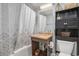 Bathroom with a sink vanity, bathtub, and shower at 6900 N Ocean Blvd. # 421, Myrtle Beach, SC 29572