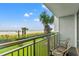 Balcony with chairs offers ocean and beach views at 7200 N Ocean Blvd. # 224, Myrtle Beach, SC 29572