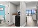 Kitchenette with granite counters, small refrigerator, and microwave with ocean view at 7200 N Ocean Blvd. # 224, Myrtle Beach, SC 29572